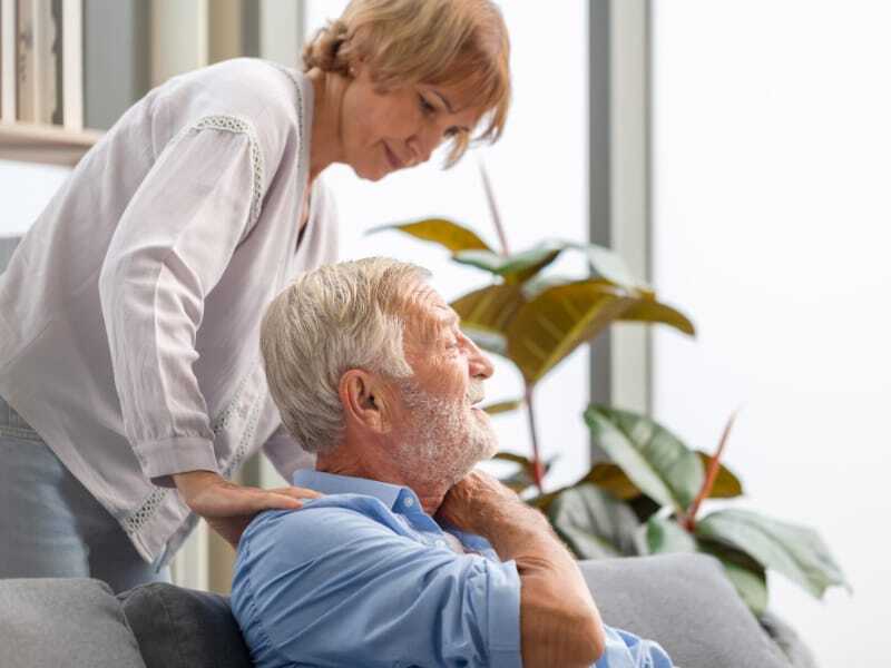 caregiver-with-hand-on-residents-shoulder